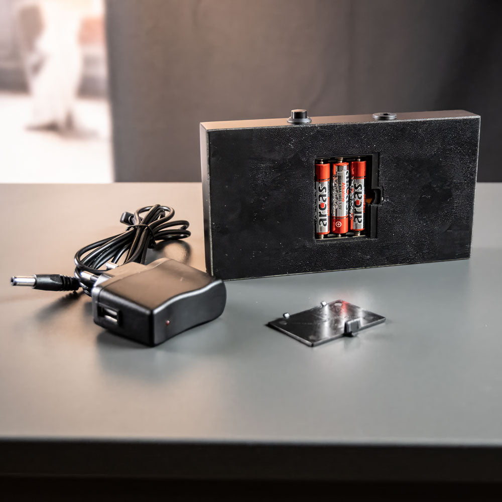 Luxury light base with open battery compartment, AAA batteries and power supply