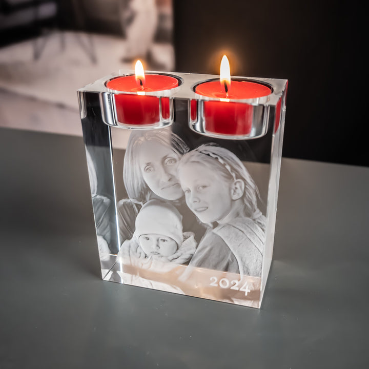 Holder for 2 tea lights seen from above with two lit red tea lights