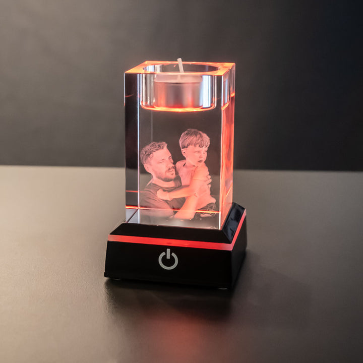Black light base with glass block with engraved photo in red light