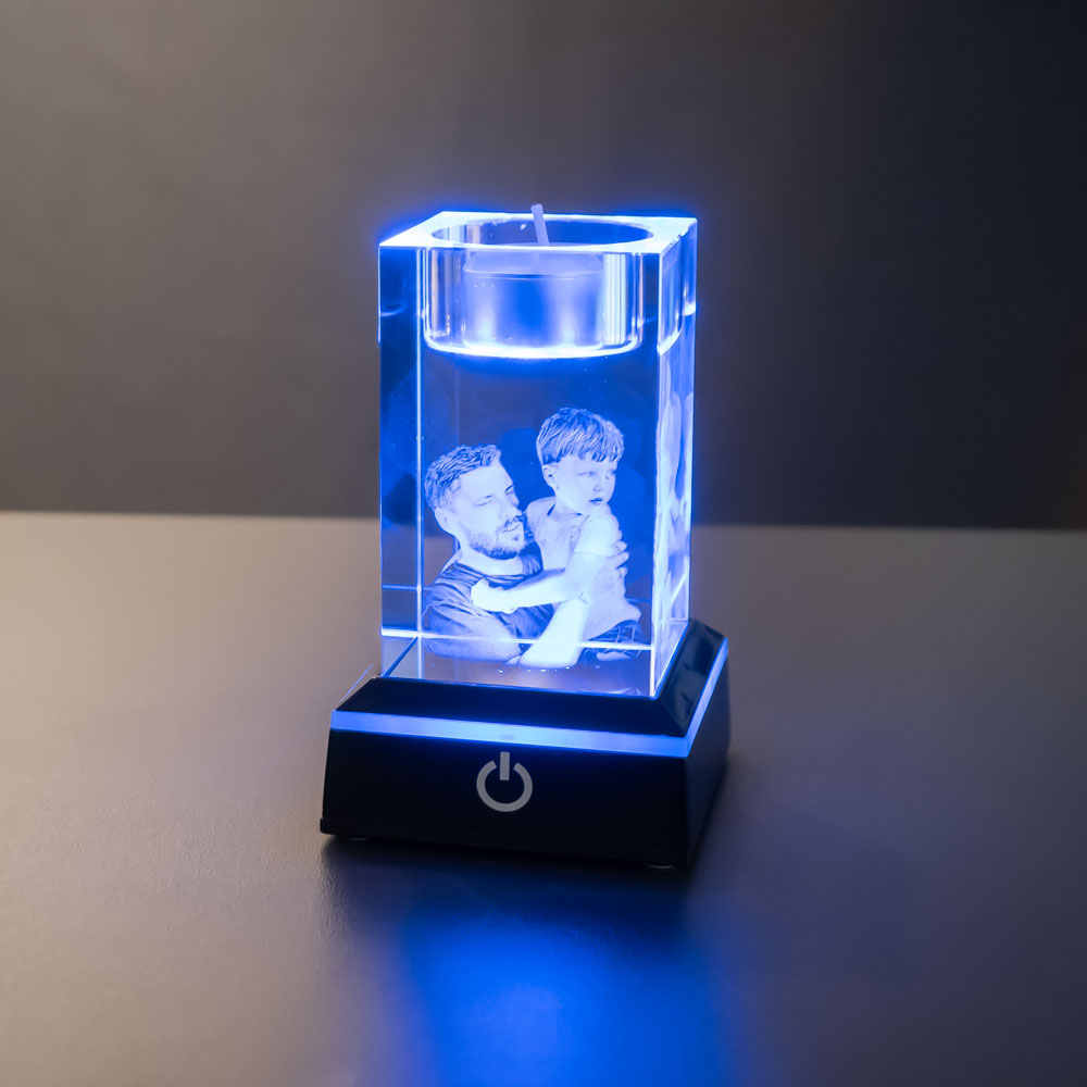 Black light base with glass block with engraved photo in blue light