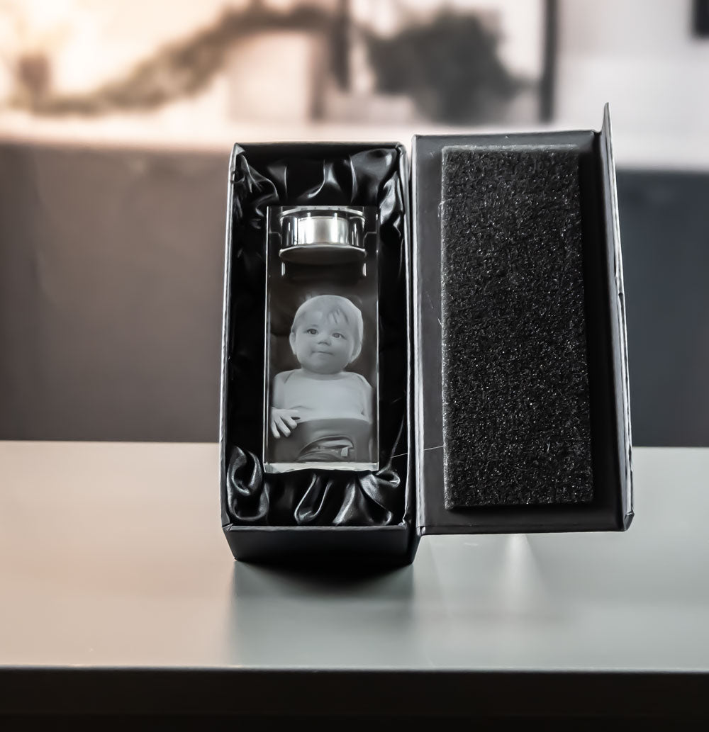 Tea light holder with engraved child in a black gift box with satin lining
