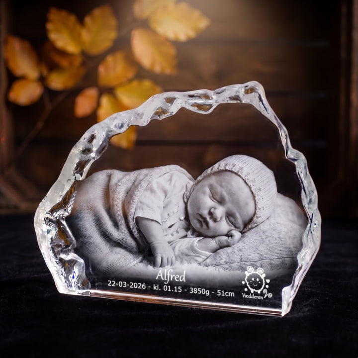 Iceberg-shaped crystal glass block with 3D laser-engraved sleeping baby and birth details