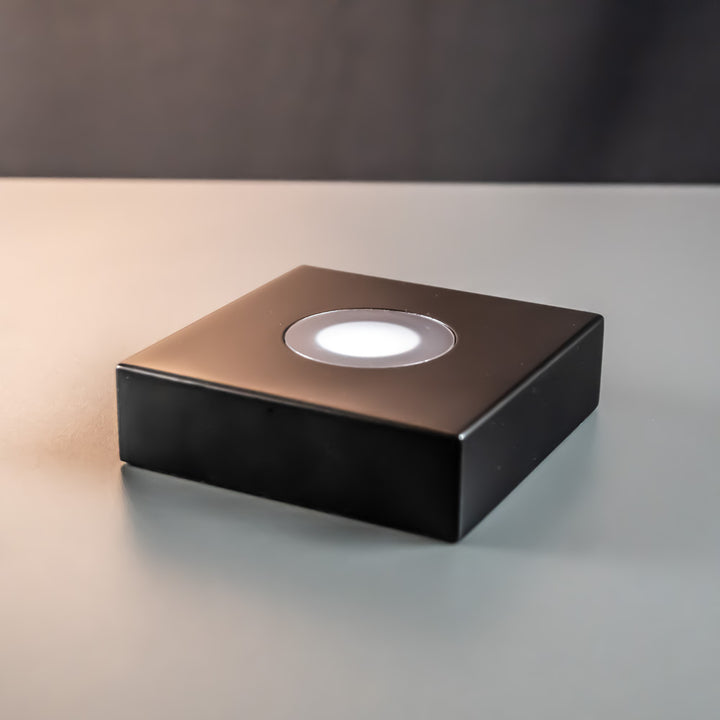 Matte black luxury light base with white LED light