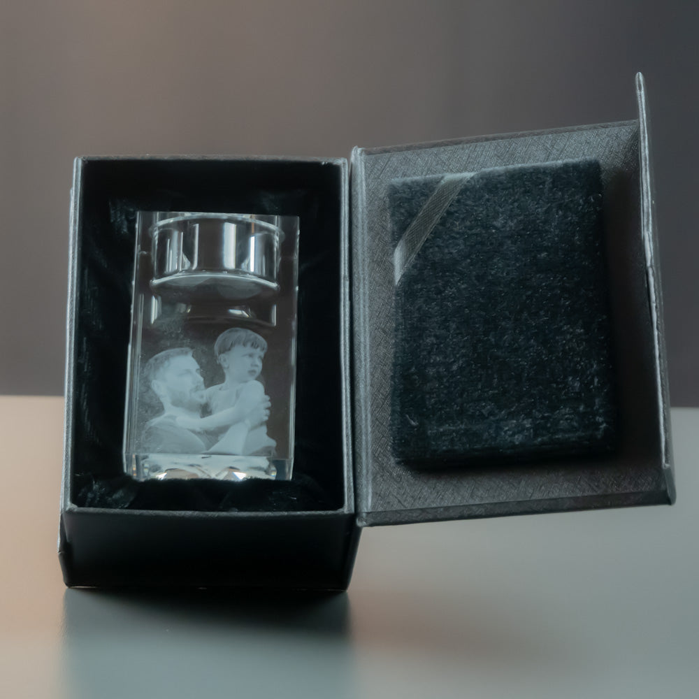 Tea light holder with engraved father and son in an open black gift box