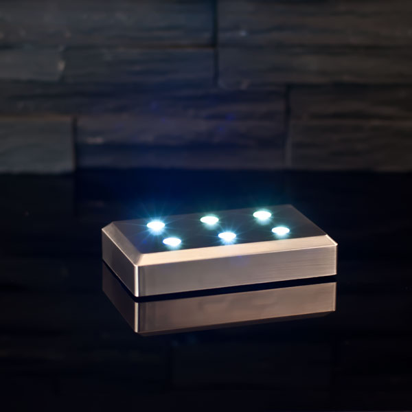 Battery light base 6x10 cm with white LED light on