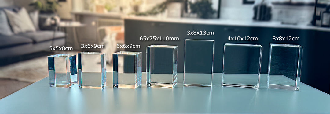 Rectangular crystal glass blocks in all sizes lined up in a row